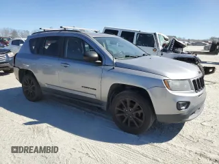 2015 Jeep Compass Sport with VIN 1C4NJDBB4FD426641, listed as a Copart auction lot 47440235 with 124,386 mi miles and Salvage Title. Bid and sale history available at carsss.com. Image 4.