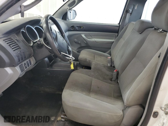 2014 Toyota Tacoma with VIN 5TFNX4CNXEX041332, listed as a Copart auction lot 56026455 with 151,947 mi miles and Salvage title. Bid and sale history available at DreamBid. Image 7.
