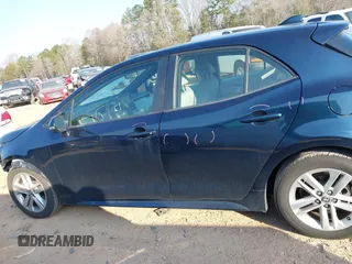 2021 Toyota Corolla Hatchback SE with VIN JTND4MBE9M3114388, listed as a IAAI auction lot 41796303 with 58,656 mi miles. Bid and sale history available at carsss.com. Image 14.