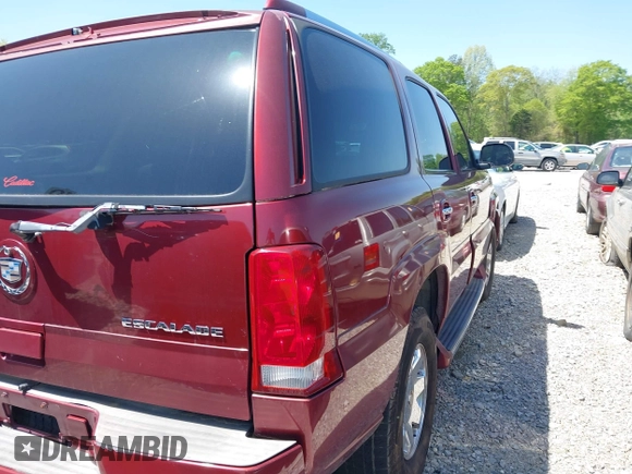 2003 Cadillac Escalade z VIN 1GYEC63T63R132602, wystawiony jako IAAI lot #41778576 z przebiegiem 242 443 mil mil oraz . Historia ofert i sprzedaży dostępna na DreamBid. Obrazek 4.