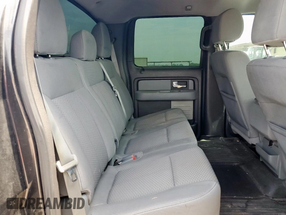 2012 Ford F-150 XL z VIN 1FTFW1CF2CKD77999, wystawiony jako Copart lot #57271655 z przebiegiem 168 577 mil mil oraz Szkody całkowita. Historia ofert i sprzedaży dostępna na DreamBid. Obrazek 10.