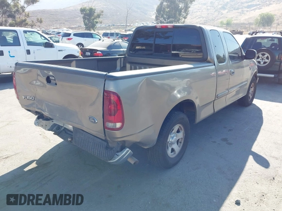 2002 Ford F-150 XL with VIN 1FTRX17WX2NA97846, listed as a IAAI auction lot 42682857 with 185,438 mi miles and . Bid and sale history available at DreamBid. Image 4.
