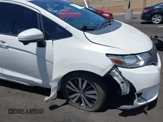 2015 Honda Fit EX-L with VIN 3HGGK5H89FM740430, listed as a IAAI auction lot 42255324 with 116,995 mi miles and . Bid and sale history available at DreamBid. Image 6.