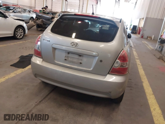 2008 Hyundai Accent GS with VIN KMHCM36C78U066341, listed as a IAAI auction lot 41377961 with 354,357 mi miles. Bid and sale history available at carsss.com. Image 16.