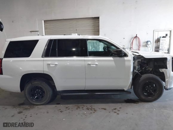2020 Chevrolet Tahoe Commercial with VIN 1GNLCDEC8LR283902, listed as a IAAI auction lot 41670895 with 91,508 mi miles. Bid and sale history available at carsss.com. Image 14.