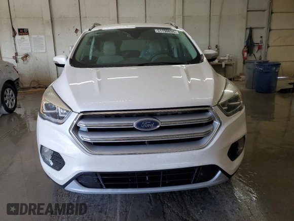 2019 Ford Escape Titanium с VIN 1FMCU0J94KUA44606, выставлен на аукционе Copart как лот 51790035 с пробегом 70 190 миль миль и На запчасти • Non repairable. История ставок и продаж доступна на DreamBid. Изображение 5.