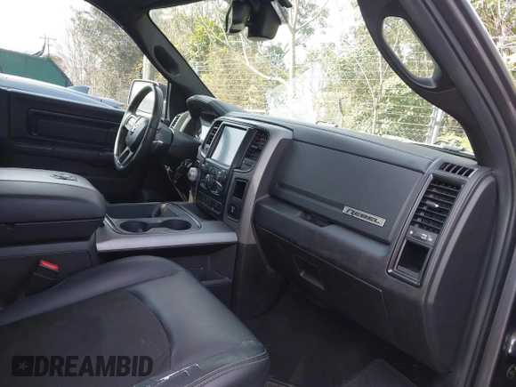 2017 Ram 1500 Rebel z VIN 1C6RR7YT0HS784756, wystawiony jako IAAI lot #41543549 z przebiegiem 146 727 mil mil oraz . Historia ofert i sprzedaży dostępna na DreamBid. Obrazek 5.