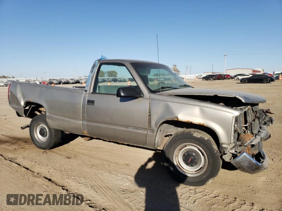 2000 GMC Sierra 1500 with VIN 1GTGC24R5YR198477, listed as a Copart auction lot 76717374 with 109,201 mi miles and Salvage Title. Bid and sale history available at DreamBid. Image 4.
