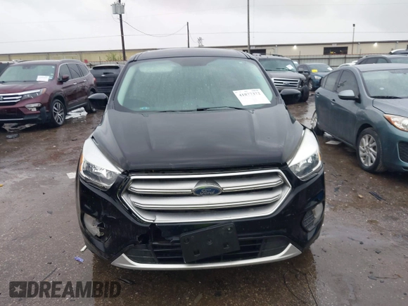 2017 Ford Escape SE with VIN 1FMCU0GD4HUE93661, listed as a IAAI auction lot 41877372 with 63,778 mi miles. Bid and sale history available at carsss.com. Image 12.