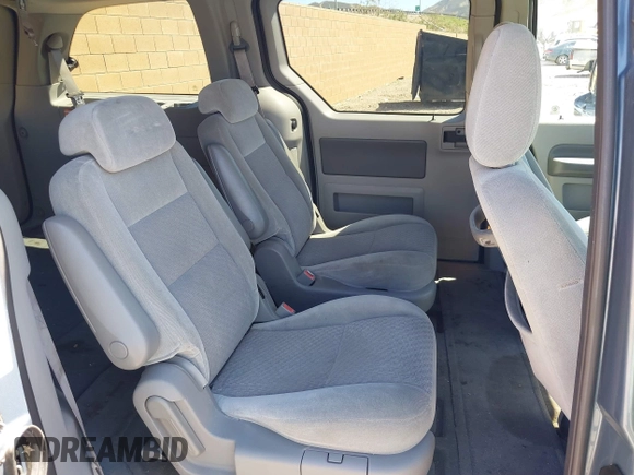 2004 Ford Freestar SEL z VIN 2FMDA52264BA43428, wystawiony jako IAAI lot #41872931 z przebiegiem 118 764 mil mil oraz . Historia ofert i sprzedaży dostępna na DreamBid. Obrazek 8.
