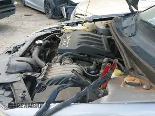 2013 Chrysler 200 Touring z VIN 1C3CCBBB9DN574401, wystawiony jako IAAI lot #43345235 z przebiegiem 188 813 mil mil oraz . Historia ofert i sprzedaży dostępna na DreamBid. Obrazek 14.