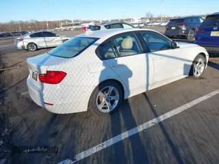 2014 BMW 3 Series 328i xDrive with VIN WBA3B5G58ENS08415, listed as a IAAI auction lot 41642668 with 51,563 mi miles and . Bid and sale history available at DreamBid. Image 4.