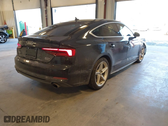 2018 Audi A5 Sportback Premium Plus with VIN WAUENCF52JA133055, listed as a IAAI auction lot 41644106 with 71,558 mi miles. Bid and sale history available at carsss.com. Image 4.