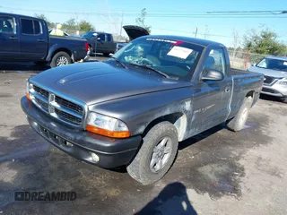 2001 Dodge Dakota with VIN 1B7FL26X91S342103, listed as a IAAI auction lot 41277465 with 157,993 mi miles. Bid and sale history available at carsss.com. Image 2.