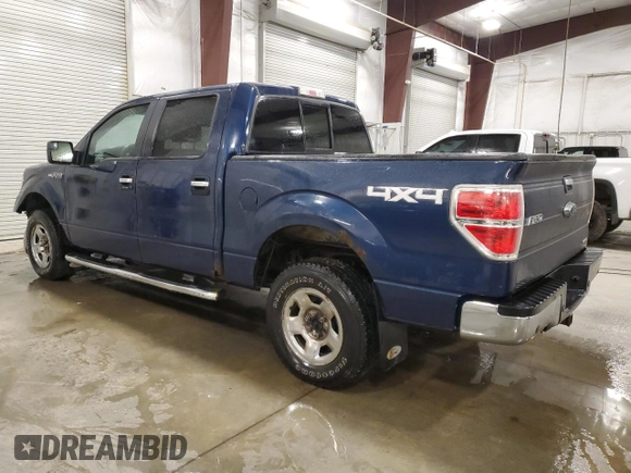 2013 Ford F-150 XL with VIN 1FTFW1EF9DKE61705, listed as a Copart auction lot 61339085 with 169,322 mi miles and Salvage title. Bid and sale history available at DreamBid. Image 2.