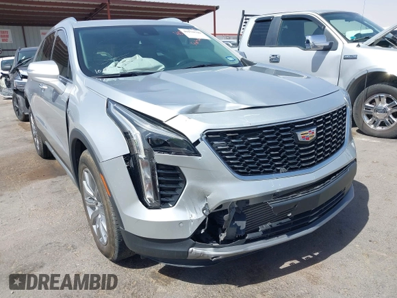 2021 Cadillac XT4 FWD Premium Luxury with VIN 1GYFZCR42MF005253, listed as a IAAI auction lot 40470700 with 70,571 mi miles and . Bid and sale history available at carsss.com. Image 6.