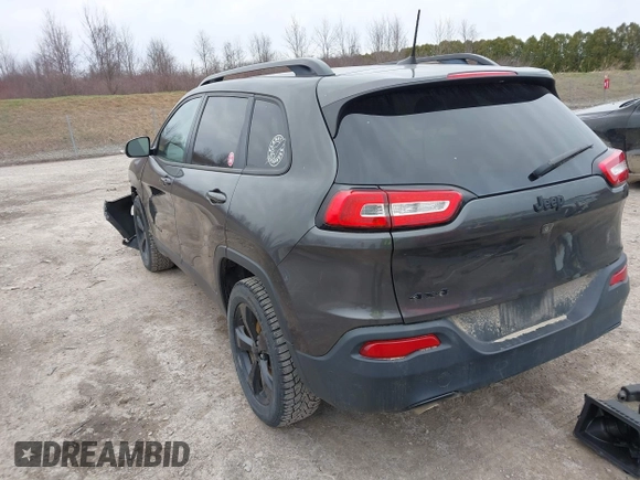 2016 Jeep Cherokee 75th Anniversary with VIN 1C4PJMCB0GW156076, listed as a IAAI auction lot 41946760 with 105,571 mi miles. Bid and sale history available at carsss.com. Image 3.