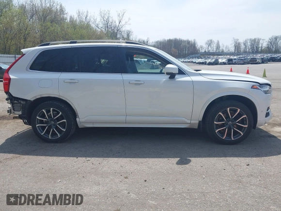 2016 Volvo XC90 T6 Momentum z VIN YV4A22PK1G1088978, wystawiony jako IAAI lot #42131256 z przebiegiem 96 710 mil mil oraz . Historia ofert i sprzedaży dostępna na DreamBid. Obrazek 14.