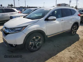 2017 Honda CR-V Touring with VIN 2HKRW1H96HH517669, listed as a Copart auction lot 52150615 with 97,961 mi miles and Salvage Title. Bid and sale history available at carsss.com. Image 1.