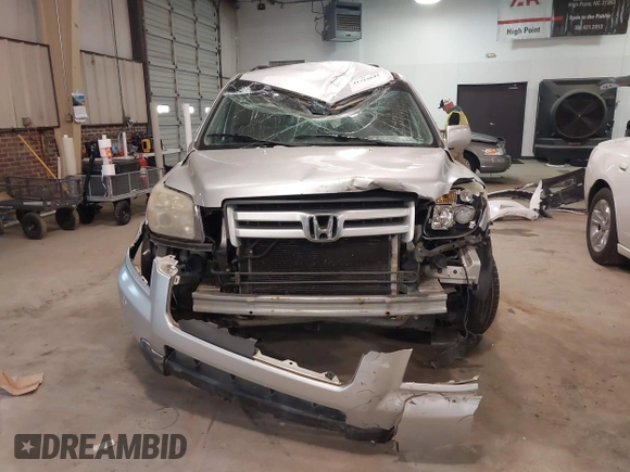 2006 Honda Pilot EX with VIN 2HKYF18416H534697, listed as a IAAI auction lot 41715642 with 224,093 mi miles and . Bid and sale history available at DreamBid. Image 6.