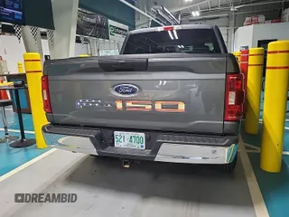 2023 Ford F-150 XL with VIN 1FTFW1ED6PFA15040, listed as a IAAI auction lot 42547272 with 74,820 mi miles and . Bid and sale history available at DreamBid. Image 1.