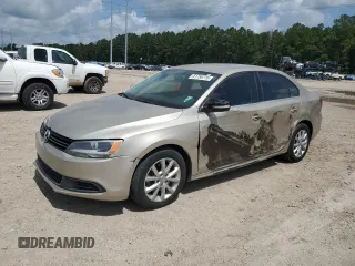 2014 Volkswagen Jetta SE with VIN 3VWD07AJ4EM299401, listed as a Copart auction lot 61756715 with 133,246 mi miles and Salvage title. Bid and sale history available at DreamBid. Image 1.