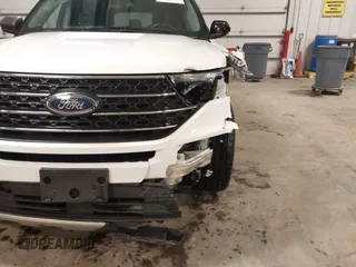 2022 Ford Explorer XLT z VIN 1FMSK8DH4NGB05636, wystawiony jako IAAI lot #42211545 z przebiegiem 55 366 mil mil oraz . Historia ofert i sprzedaży dostępna na DreamBid. Obrazek 6.