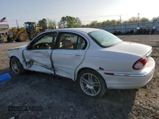 2005 Jaguar X-Type z VIN SAJWB52D55XE26531, wystawiony jako Copart lot #50909445 z przebiegiem 158 861 mil mil oraz Szkoda całkowita • Salvage title. Historia ofert i sprzedaży dostępna na DreamBid. Obrazek 2.