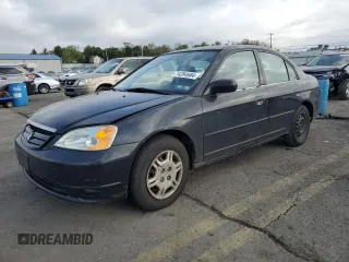 2001 Honda Civic LX with VIN 2HGES16571H607178, listed as a Copart auction lot 74284684 with 144,969 mi miles and Salvage Title. Bid and sale history available at carsss.com. Image 1.
