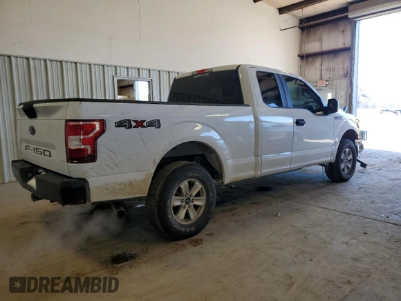 2018 Ford F-150 XL with VIN 1FTFX1E56JFC69571, listed as a Copart auction lot 45755715 with 156,830 mi miles and Salvage title. Bid and sale history available at DreamBid. Image 3.