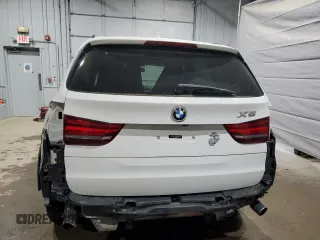 2014 BMW X5 xDrive35i z VIN 5UXKR0C5XE0K43083, wystawiony jako Copart lot #59182445 z przebiegiem 163 171 mil mil oraz Szkoda całkowita • Salvage title. Historia ofert i sprzedaży dostępna na DreamBid. Obrazek 6.