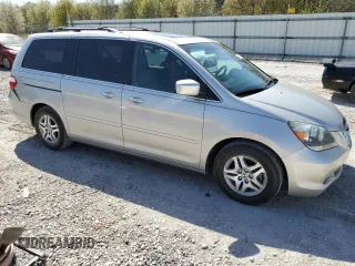2005 Honda Odyssey EX-L with VIN 5FNRL38675B411705, listed as a Copart auction lot 50131575 with 142,480 mi miles and Salvage Title. Bid and sale history available at carsss.com. Image 4.