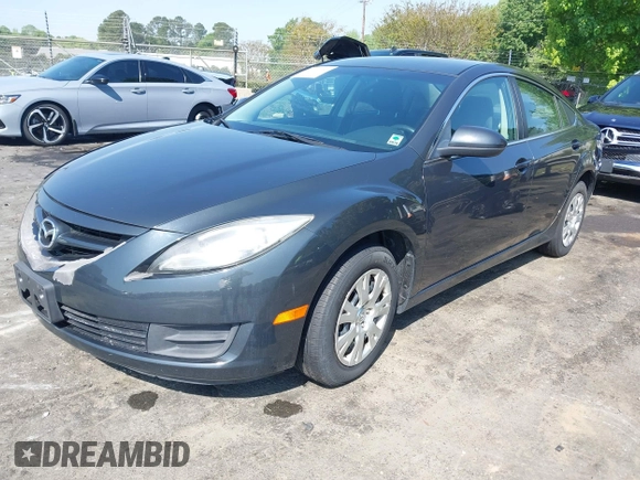 2012 Mazda 6 i Sport with VIN 1YVHZ8BH4C5M01305, listed as a IAAI auction lot 42032393 with 244,764 mi miles and . Bid and sale history available at DreamBid. Image 17.