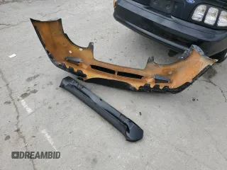 1997 Ford Mustang z VIN 1FALP4049VF169429, wystawiony jako Copart lot #59153175 z przebiegiem 134 454 mil mil oraz Szkoda całkowita • Salvage title. Historia ofert i sprzedaży dostępna na DreamBid. Obrazek 12.