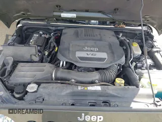 2015 Jeep Wrangler Unlimited Altitude z VIN 1C4HJWEG0FL752152, wystawiony jako IAAI lot #42311043 z przebiegiem 112 379 mil mil oraz . Historia ofert i sprzedaży dostępna na DreamBid. Obrazek 10.