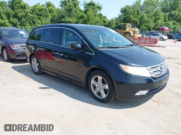 2011 Honda Odyssey Touring with VIN 5FNRL5H97BB073708, listed as a IAAI auction lot 42409164 with 141,986 mi miles and . Bid and sale history available at DreamBid. Image 1.