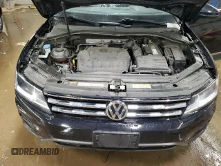 2021 Volkswagen Tiguan SE z VIN 3VV2B7AX1MM001377, wystawiony jako Copart lot #49893775 z przebiegiem 61 422 mil mil oraz Szkoda całkowita • Salvage title. Historia ofert i sprzedaży dostępna na DreamBid. Obrazek 11.