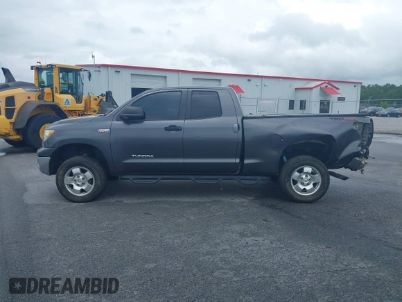 2012 Toyota Tundra z VIN 5TFUW5F10CX265994, wystawiony jako IAAI lot #42172968 z przebiegiem 197 493 mil mil oraz . Historia ofert i sprzedaży dostępna na DreamBid. Obrazek 14.