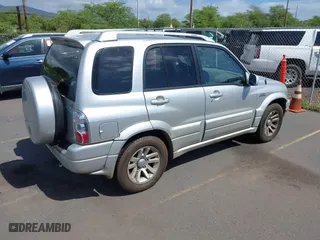 2005 Suzuki Grand Vitara with VIN JS3TE62VX54202954, listed as a IAAI auction lot 41634385 with 1 mi miles. Bid and sale history available at carsss.com. Image 4.