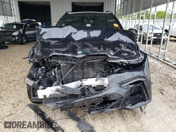 2020 BMW X7 M50i z VIN 5UXCX6C06LLE35455, wystawiony jako Copart lot #54965075 z przebiegiem Nie podano mil oraz Szkoda całkowita • Salvage title. Historia ofert i sprzedaży dostępna na DreamBid. Obrazek 5.