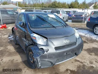 2013 Scion iQ with VIN JTNJJXB00DJ025113, listed as a IAAI auction lot 41503756 with 105,557 mi miles. Bid and sale history available at carsss.com. Image 1.