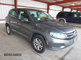 2012 Volkswagen Tiguan SEL with VIN WVGAV7AX1CW004744, listed as a IAAI auction lot 41924952 with 100,964 mi miles and . Bid and sale history available at DreamBid. Image 1.