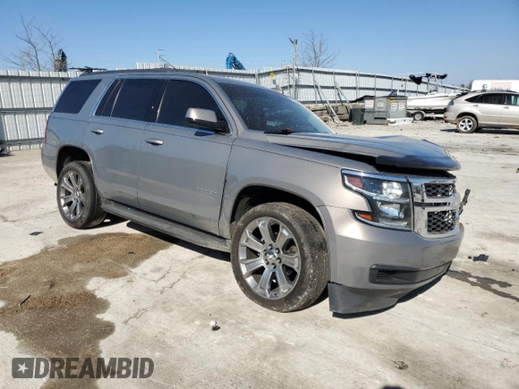 2018 Chevrolet Tahoe LS with VIN 1GNSCAKC5JR263554, listed as a Copart auction lot 48632805 with 87,445 mi miles and Salvage title. Bid and sale history available at DreamBid. Image 4.