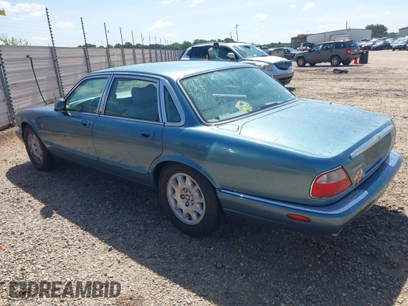 1998 Jaguar XJ with VIN SAJHX1241WC819418, listed as a IAAI auction lot 42456539 with 126,457 mi miles and . Bid and sale history available at DreamBid. Image 3.