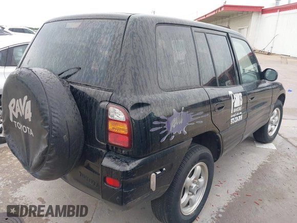 1999 Toyota RAV4 with VIN JT3GP10VXX7061972, listed as a IAAI auction lot 42474051 with 229,406 mi miles and . Bid and sale history available at DreamBid. Image 4.
