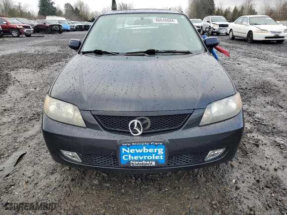 2003 Mazda Protege DX with VIN JM1BJ225331210519, listed as a Copart auction lot 86648884 with 84,258 mi miles and Salvage Title. Bid and sale history available at carsss.com. Image 5.