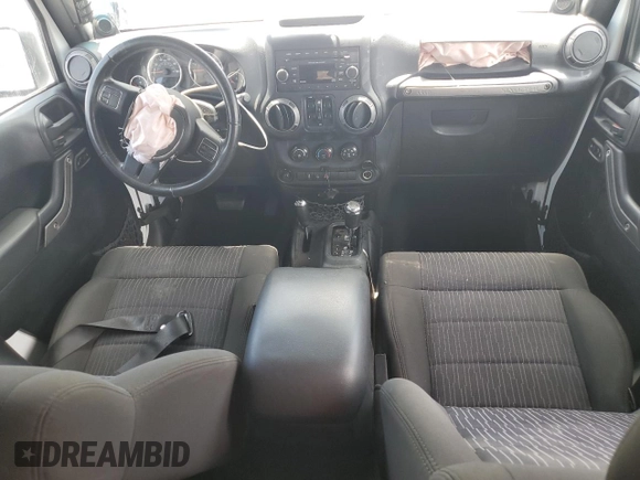 2012 Jeep Wrangler Unlimited Sport with VIN 1C4BJWDG6CL240673, listed as a Copart auction lot 60669625 with Not provided miles and Salvage title. Bid and sale history available at DreamBid. Image 8.