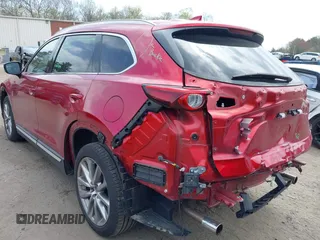 2019 Mazda CX-9 Grand Touring with VIN JM3TCBDY8K0333394, listed as a IAAI auction lot 42109778 with 58,887 mi miles and . Bid and sale history available at DreamBid. Image 3.