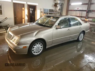 2000 Mercedes-Benz E-Class with VIN WDBJF65J8YB148175, listed as a Copart auction lot 78756544 with 79,192 mi miles and Salvage Title. Bid and sale history available at carsss.com. Image 1.