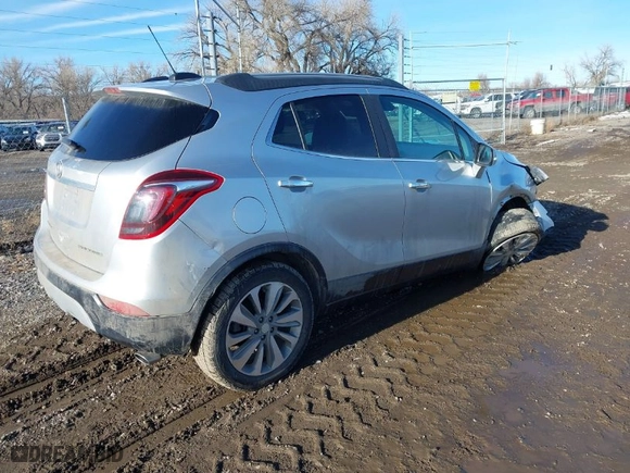 2018 Buick Encore Preferred with VIN KL4CJASB9JB602541, listed as a IAAI auction lot 41653483 with 96,802 mi miles. Bid and sale history available at carsss.com. Image 4.